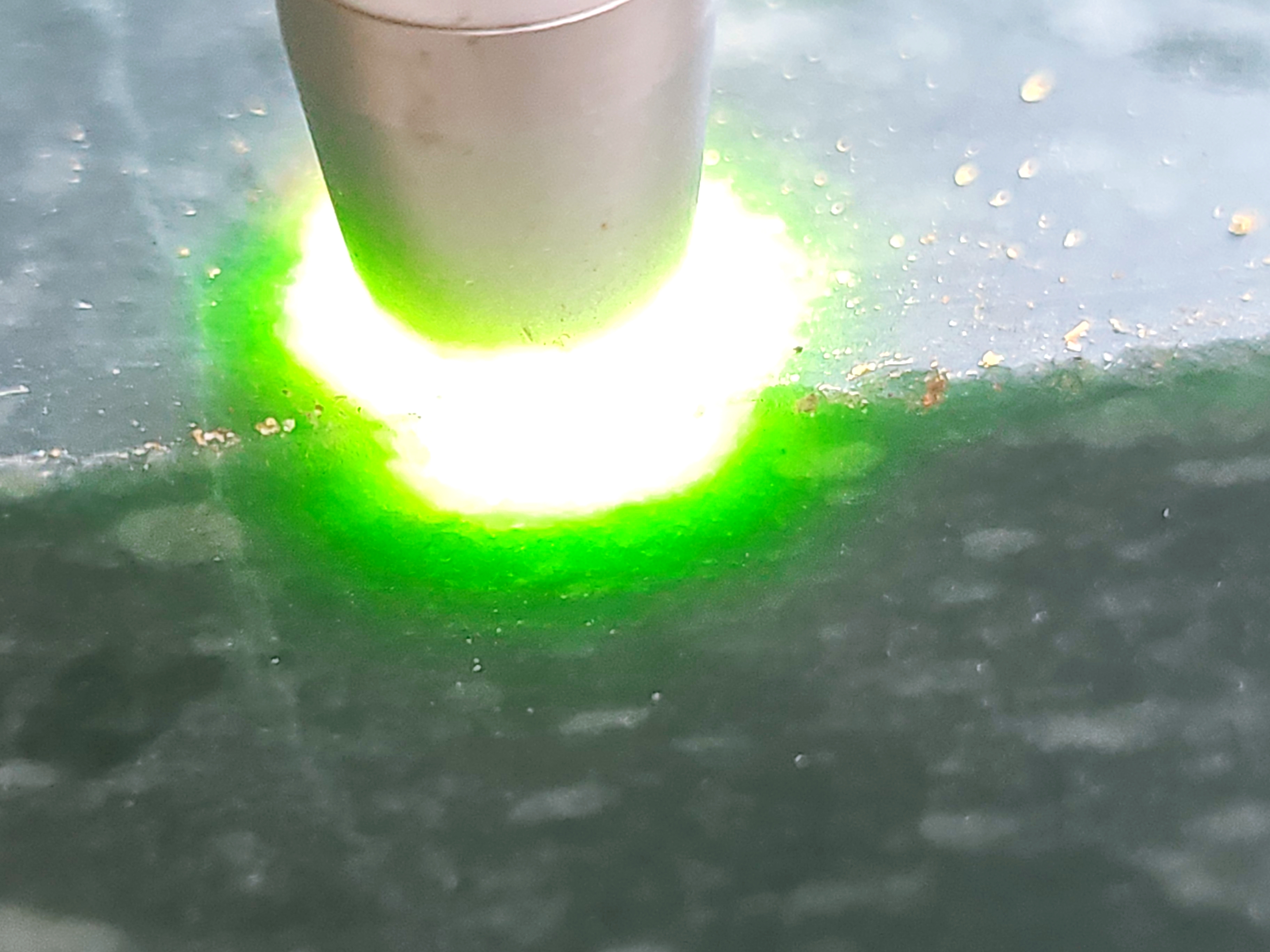 Dark green jadeite jade cutting
