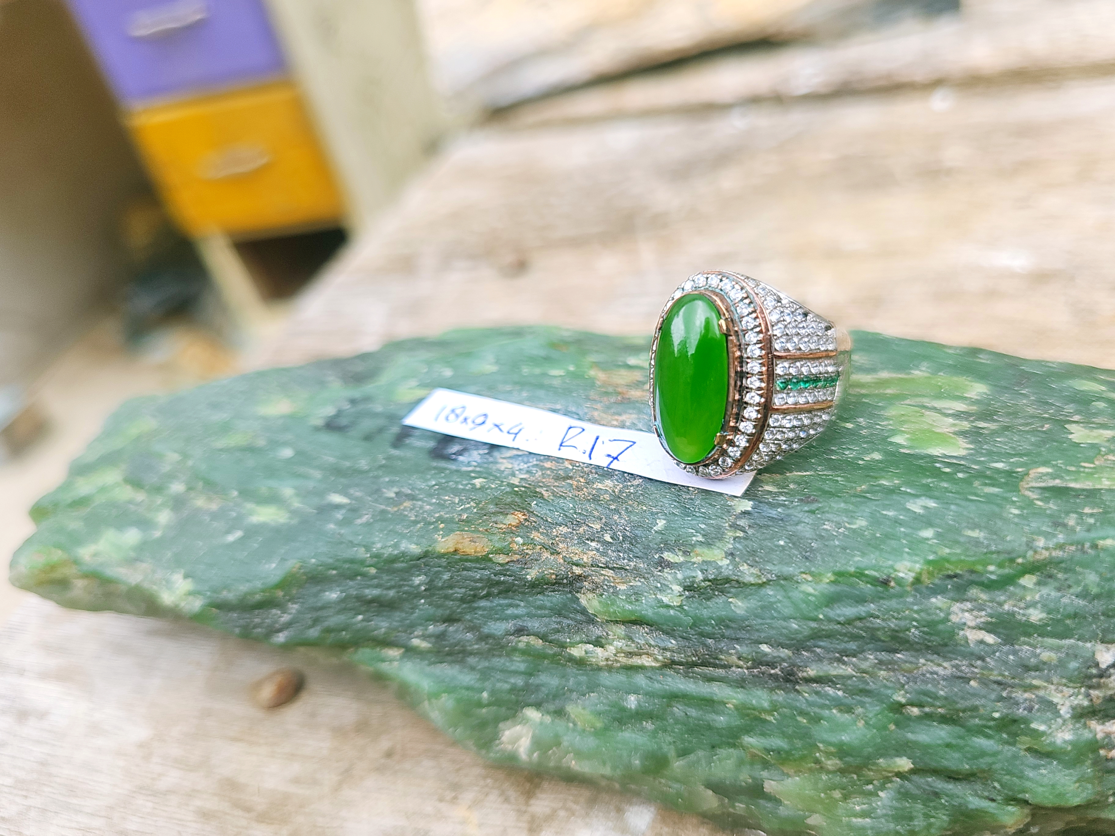 Aceh Vibrant Green Nephrite Jade Ring with Sparkling Accent Stones and Polished Oval Cabochon