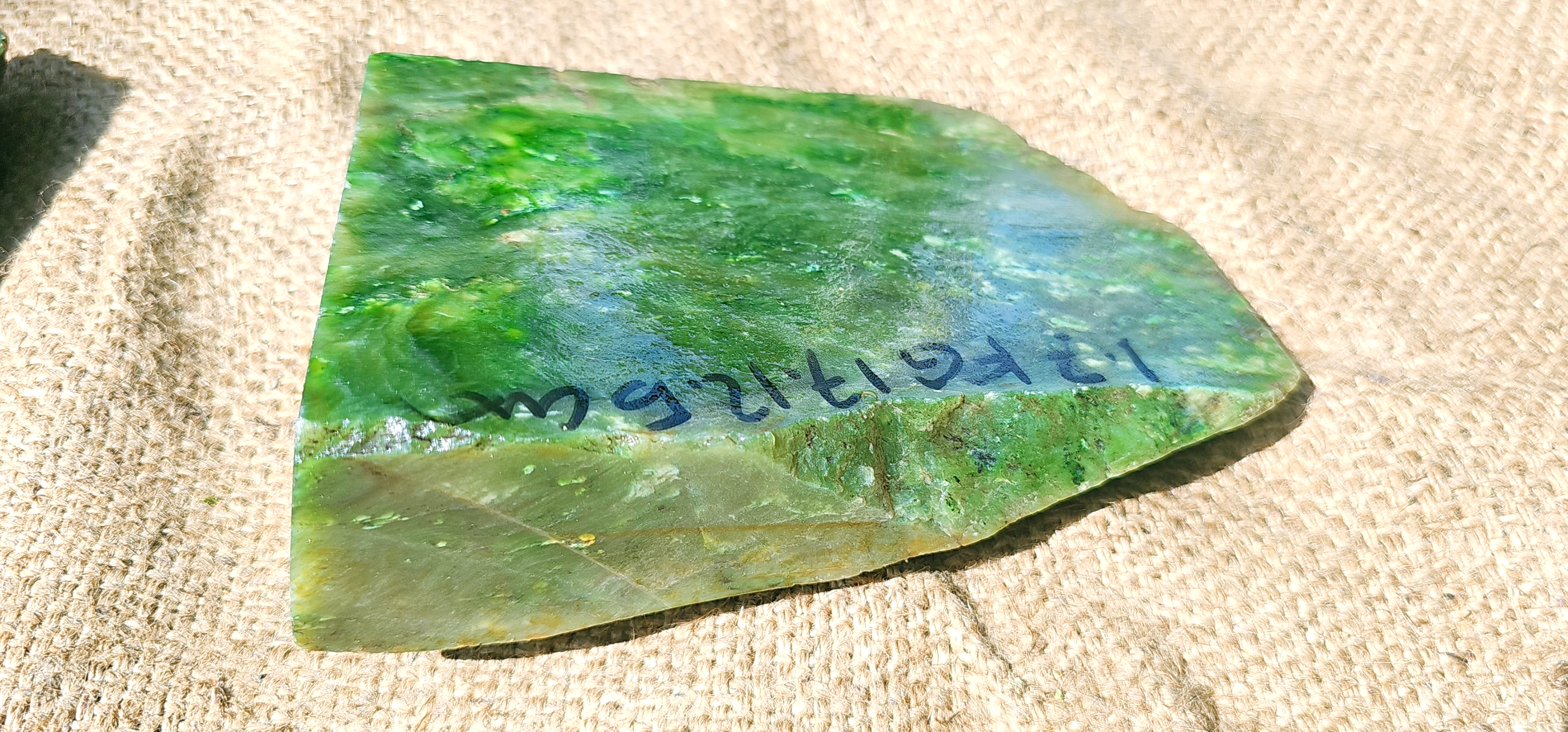 Aceh Natural Moss Green Nephrite Jade with Dynamic Clouded Veining and Textured Rough Stone Surface – 1.7 KG