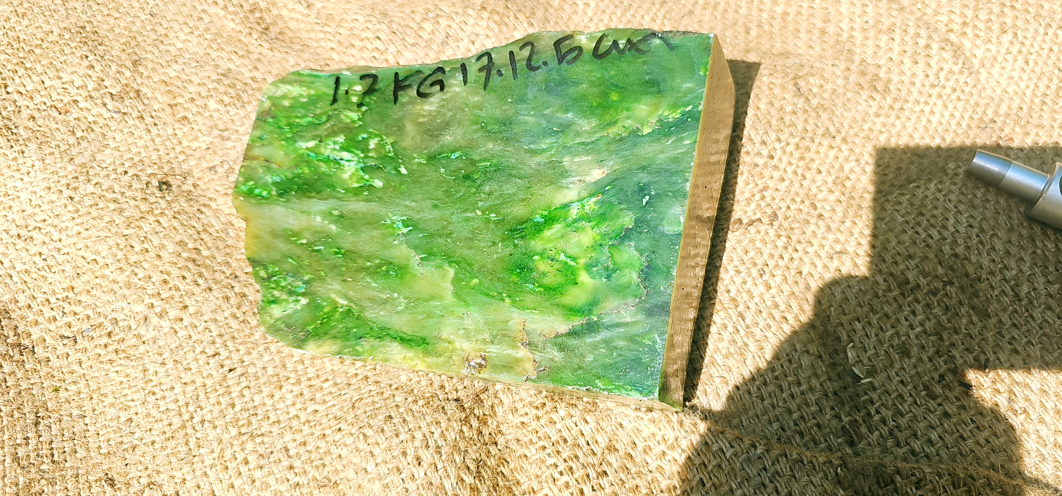 Aceh Natural Moss Green Nephrite Jade with Dynamic Clouded Veining and Textured Rough Stone Surface – 1.7 KG