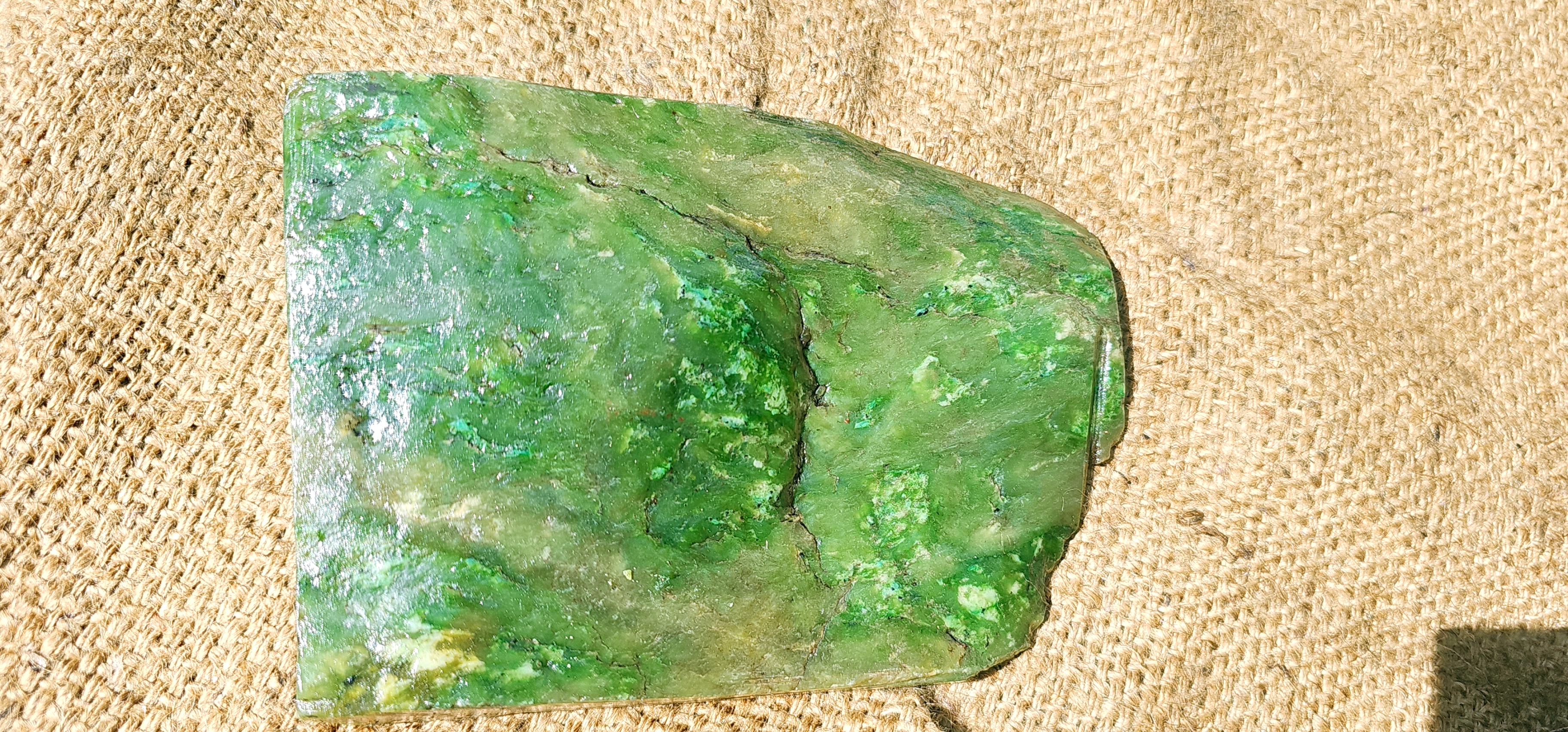 Aceh Natural Moss Green Nephrite Jade with Dynamic Clouded Veining and Textured Rough Stone Surface – 1.7 KG
