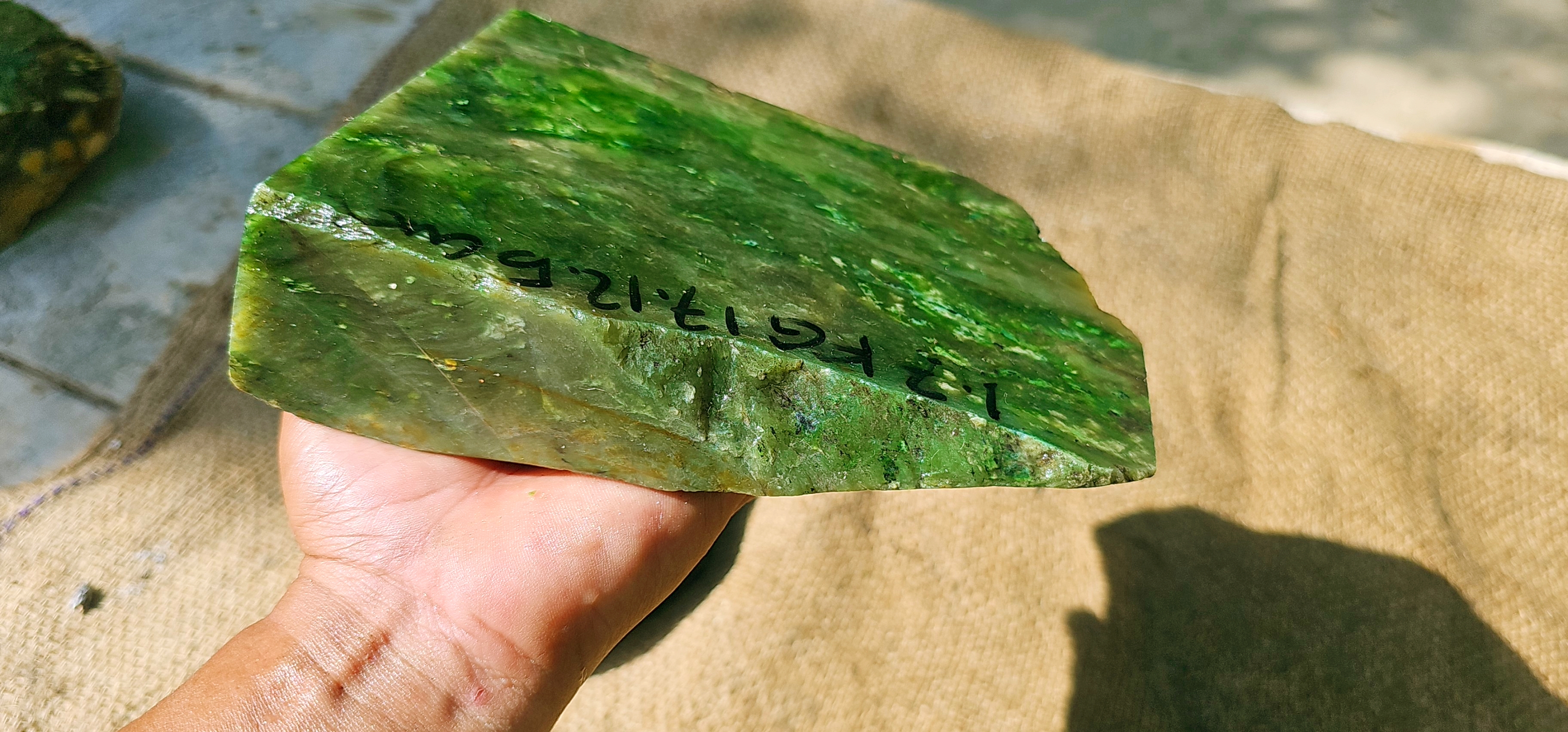 Aceh Natural Moss Green Nephrite Jade with Dynamic Clouded Veining and Textured Rough Stone Surface – 1.7 KG
