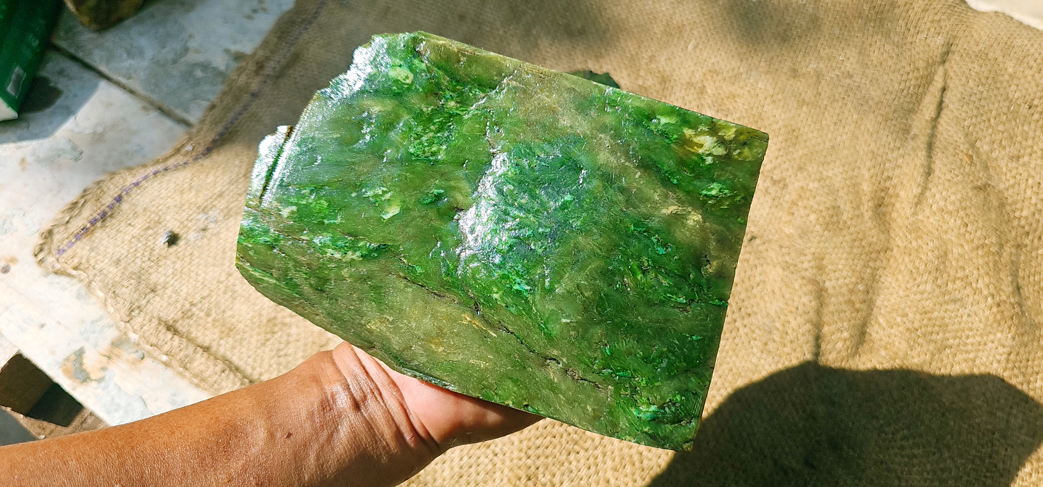 Aceh Natural Moss Green Nephrite Jade with Dynamic Clouded Veining and Textured Rough Stone Surface – 1.7 KG