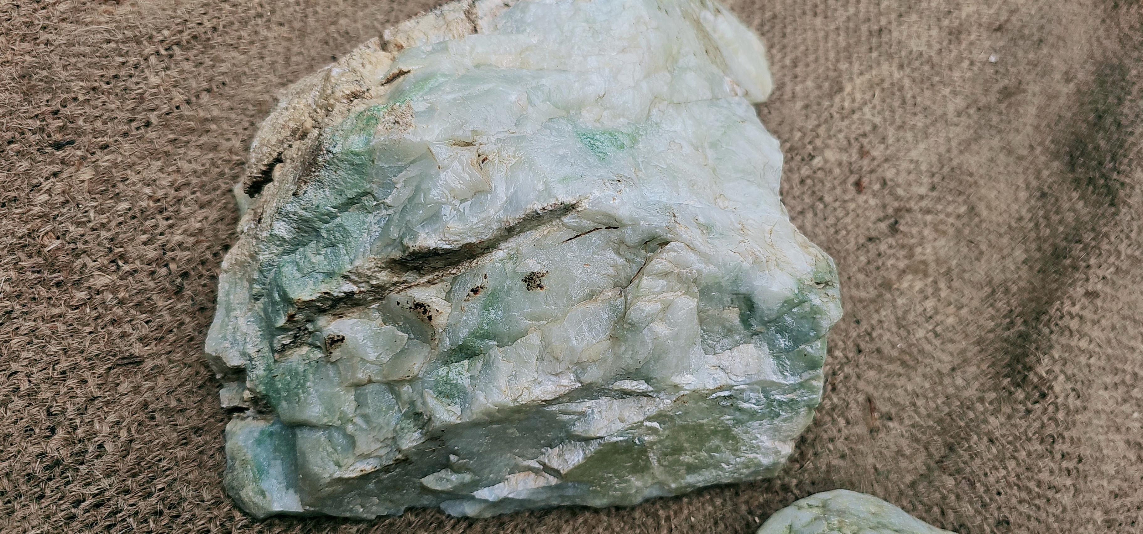 Aceh Natural Ice Jade Rough Stone with Pale Green Clouded Veining and Textured Contours – 5.3 KG