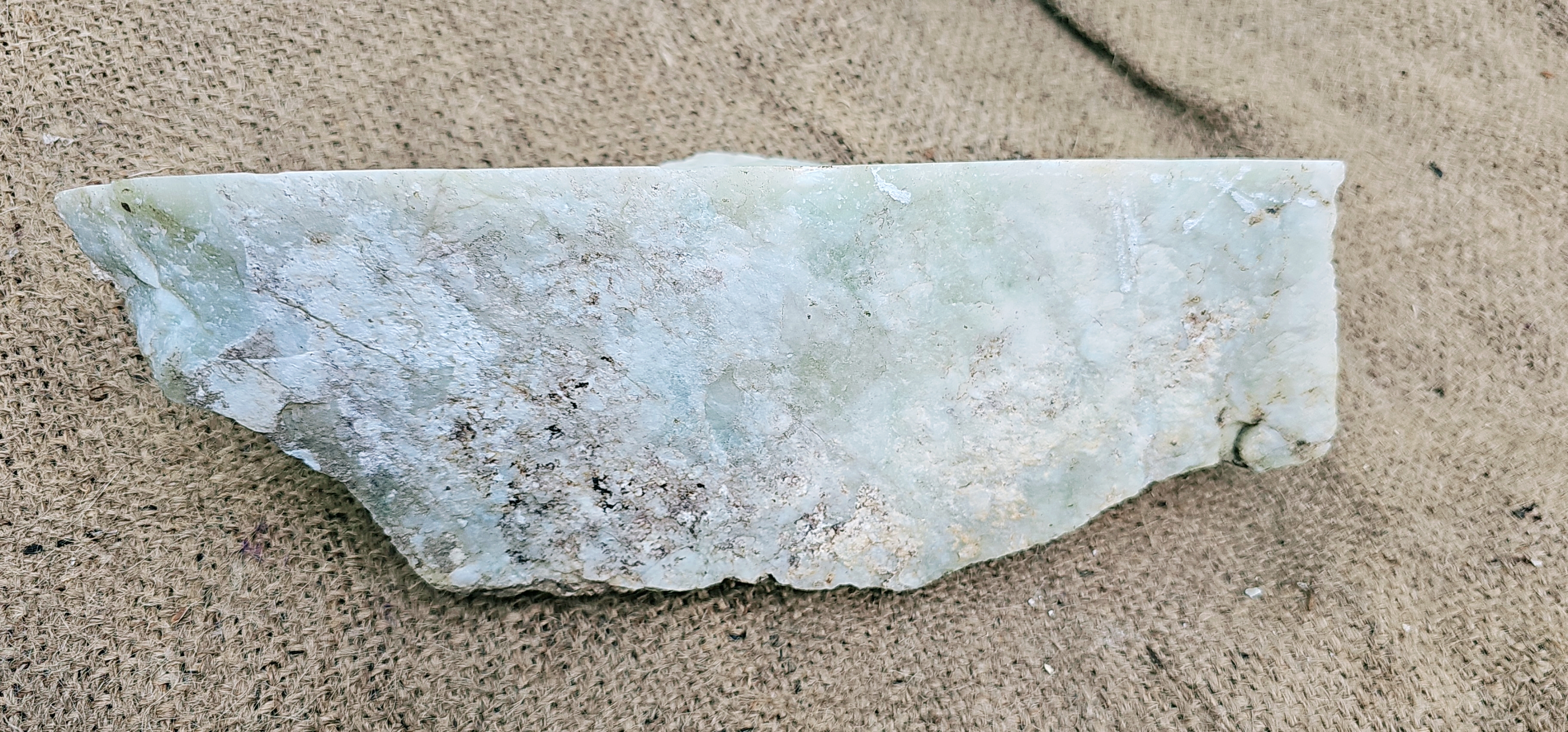 Aceh Natural Gray-Green Ice Jade Rough Stone with Feathered Mineral Patterns and Textured Exterior – 5.1 KG