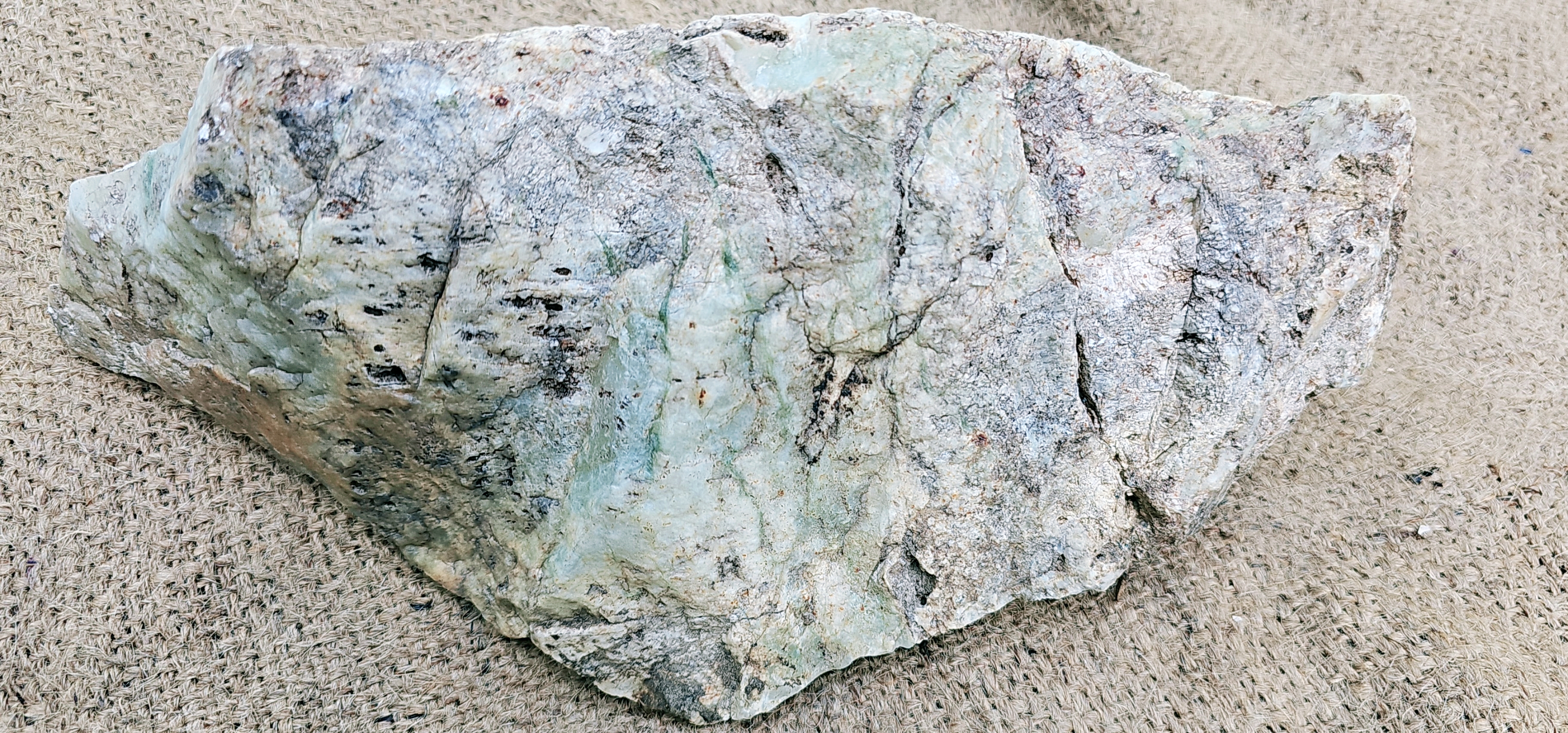Aceh Natural Gray-Green Ice Jade Rough Stone with Feathered Mineral Patterns and Textured Exterior – 5.1 KG