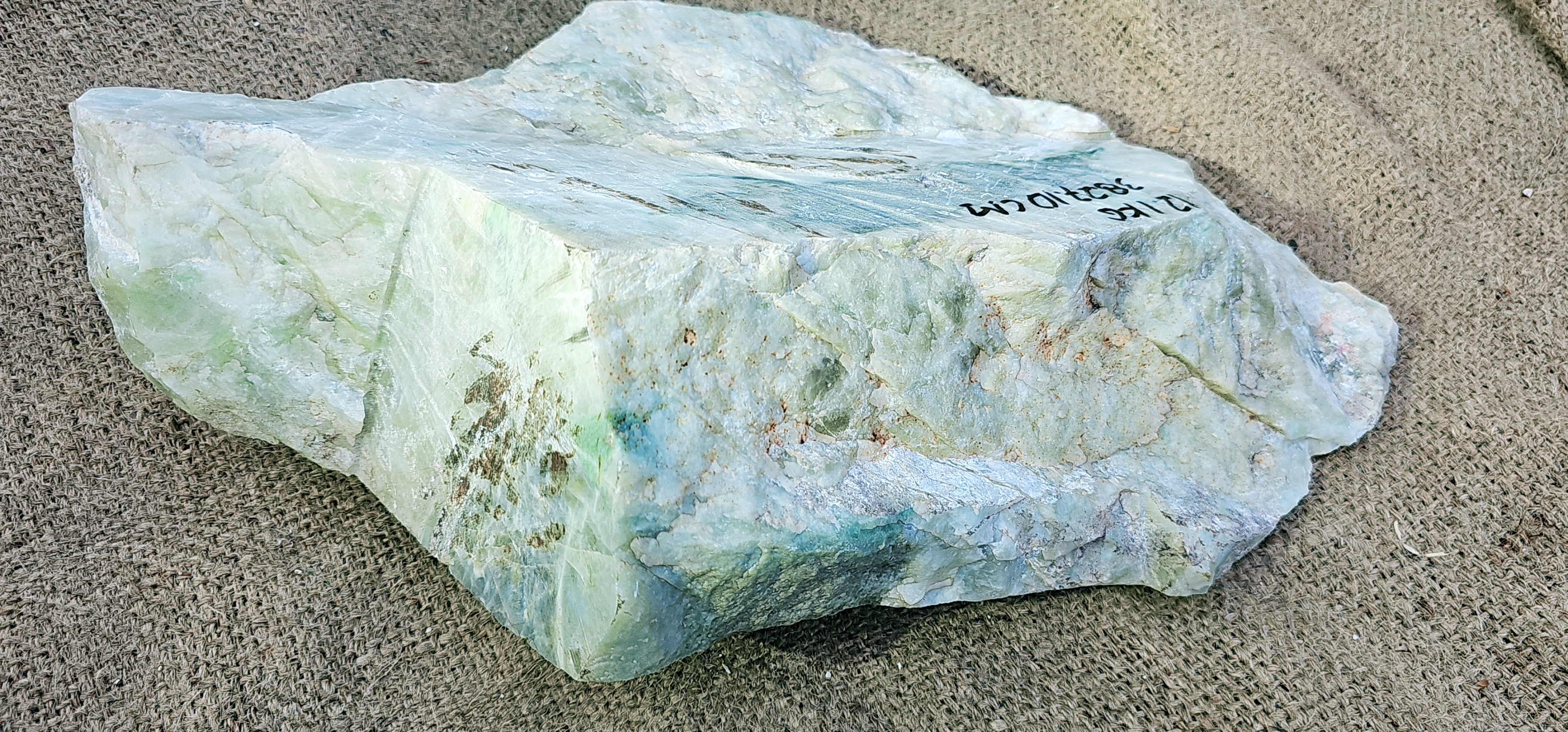Aceh Natural Moss Green and Creamy White Ice Jade Rough Stone with Dynamic Veined Patterns – 12.1 KG