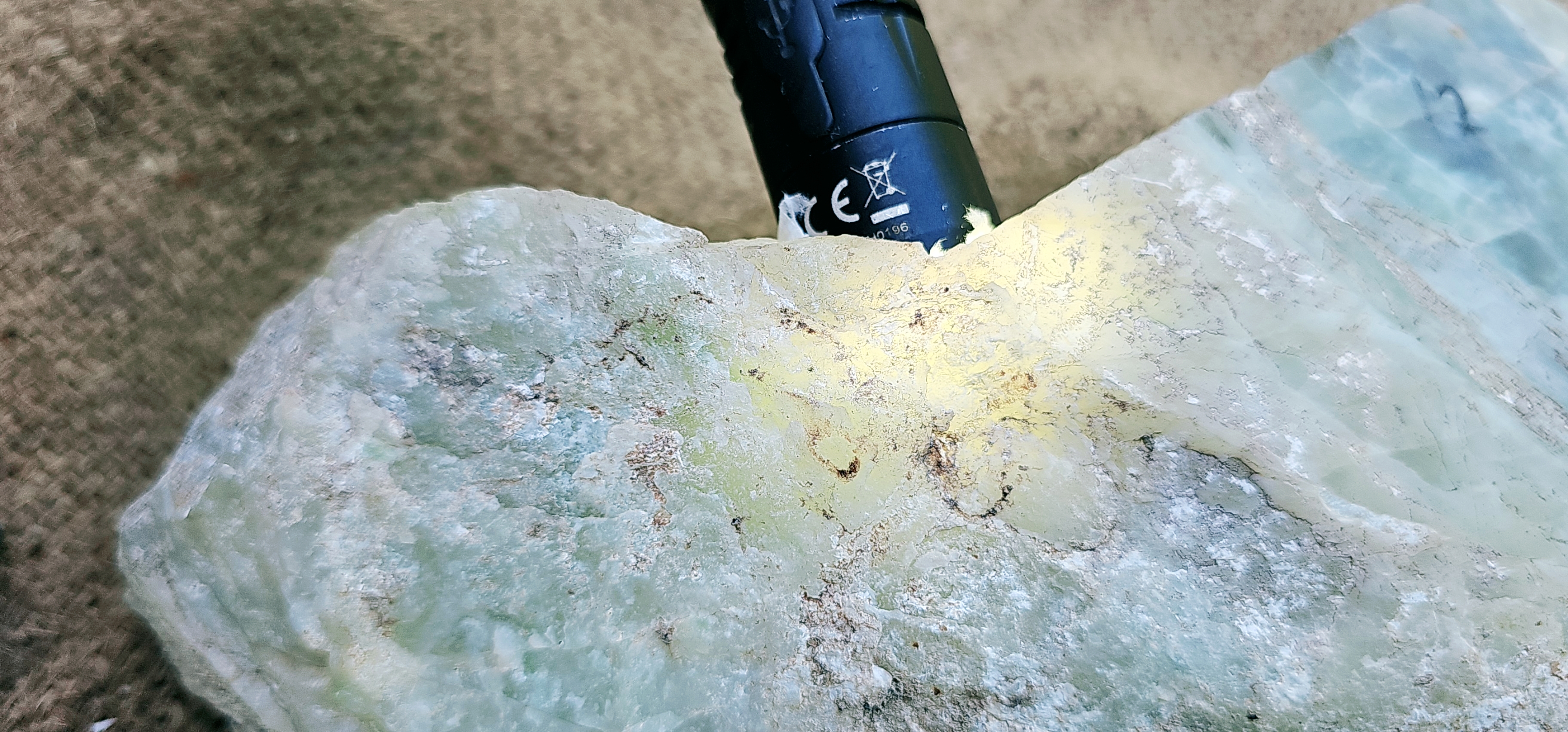 Aceh Natural Moss Green and Creamy White Ice Jade Rough Stone with Dynamic Veined Patterns – 12.1 KG