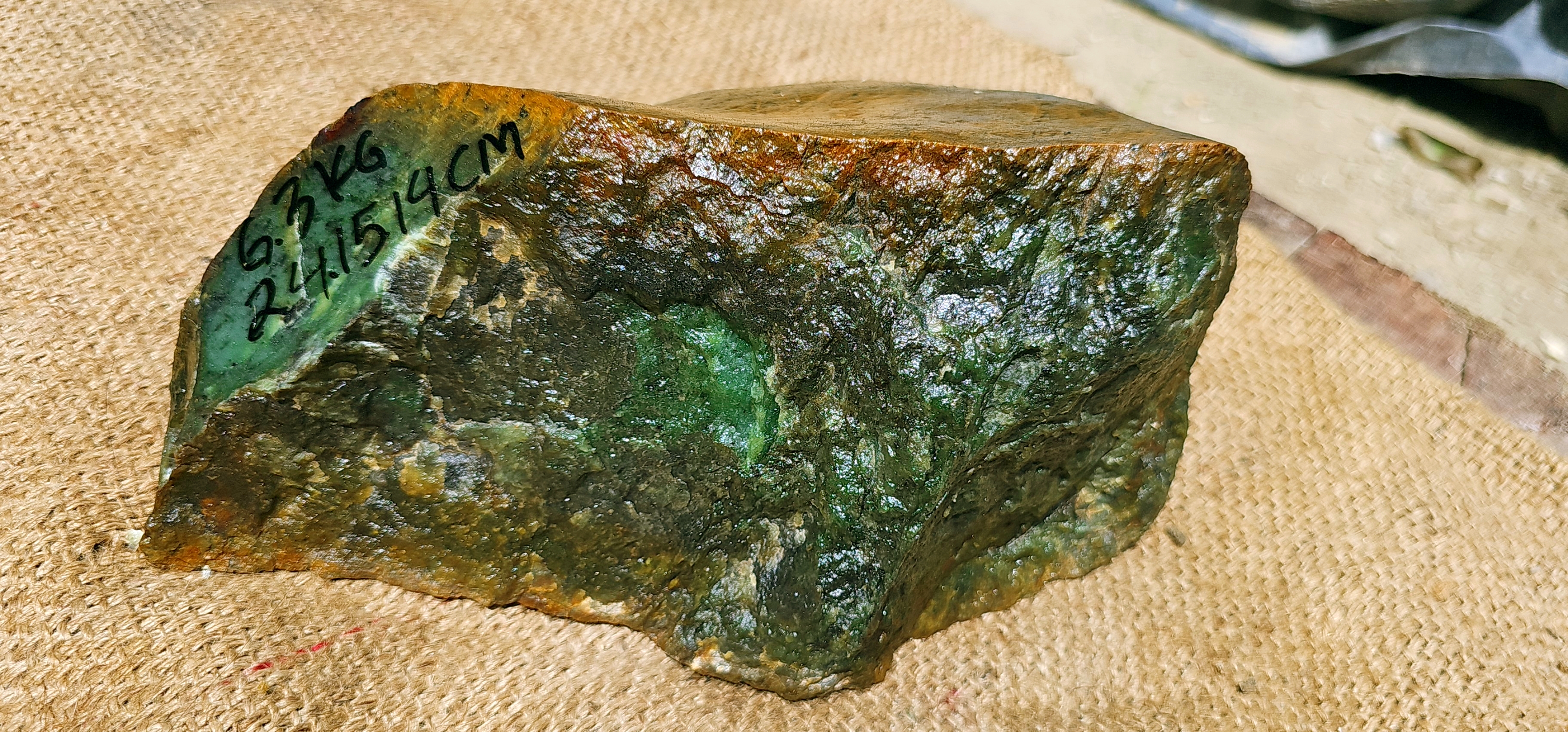 Aceh Natural Deep Nephrite Jade with Brownish Rind and Vibrant Green Translucency Rough Stone – 6.3 KG