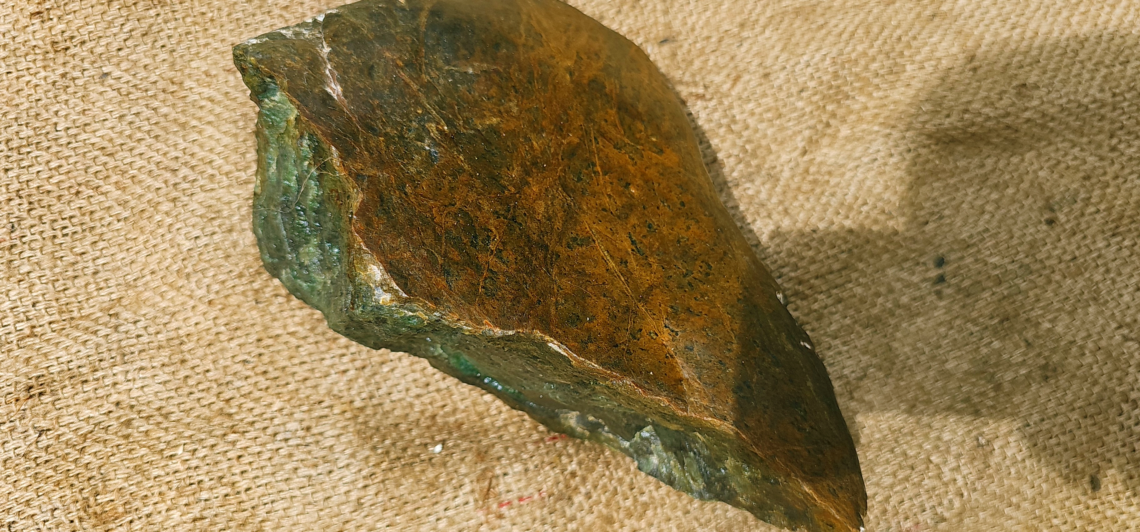 Aceh Natural Deep Nephrite Jade with Brownish Rind and Vibrant Green Translucency Rough Stone – 6.3 KG