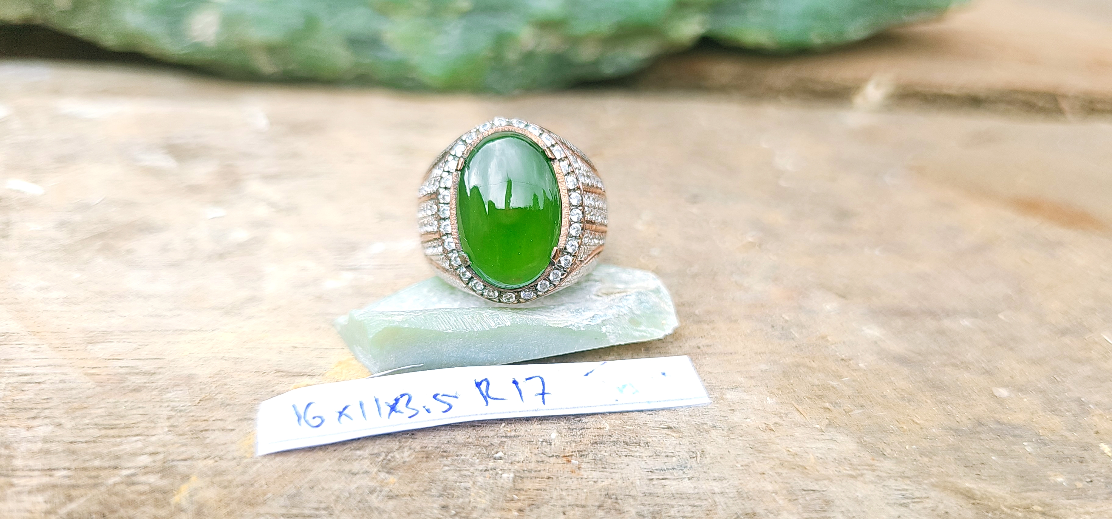Aceh Natural Moss Green Nephrite Jade Ring with Oval Cabochon Cut and Detailed Setting