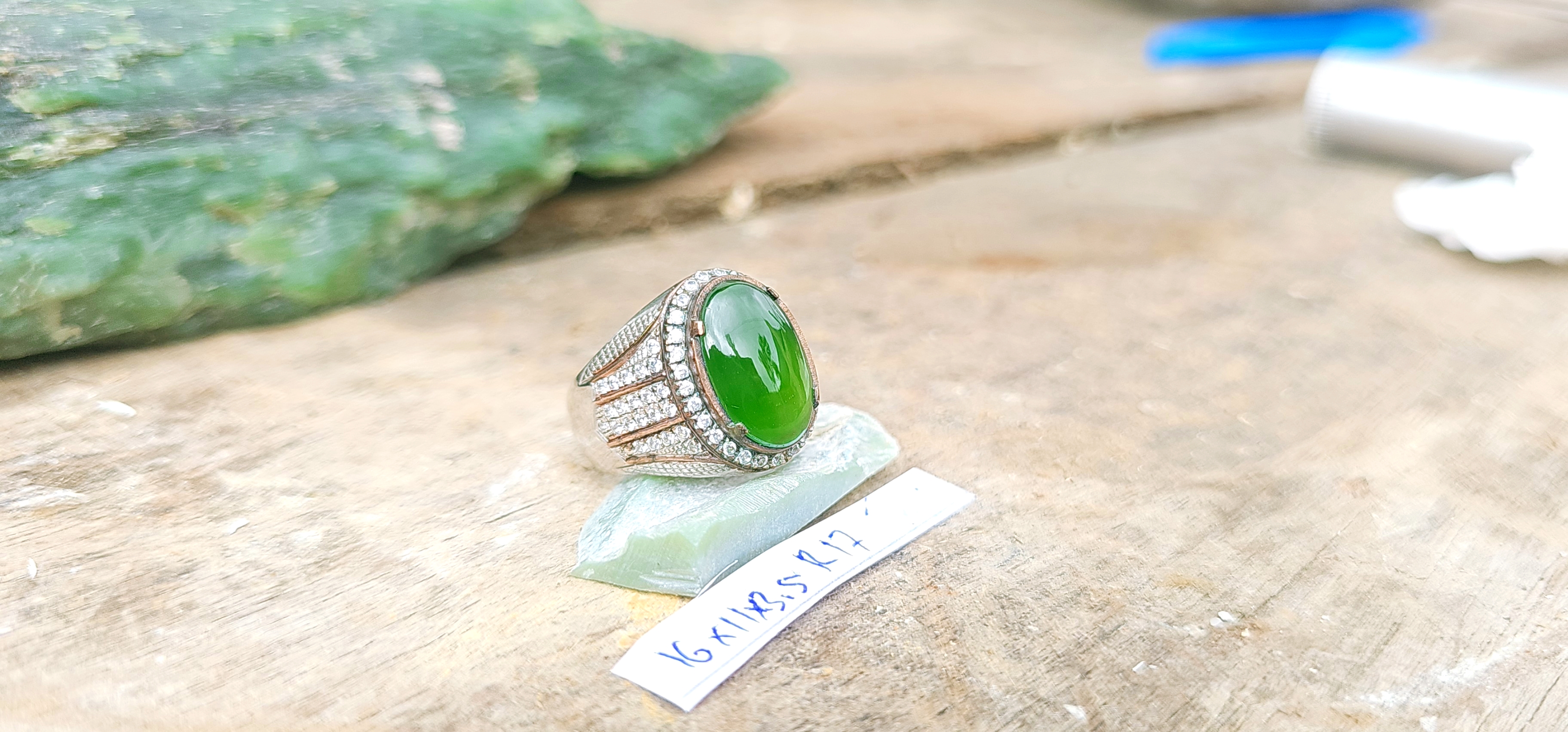 Aceh Natural Moss Green Nephrite Jade Ring with Oval Cabochon Cut and Detailed Setting