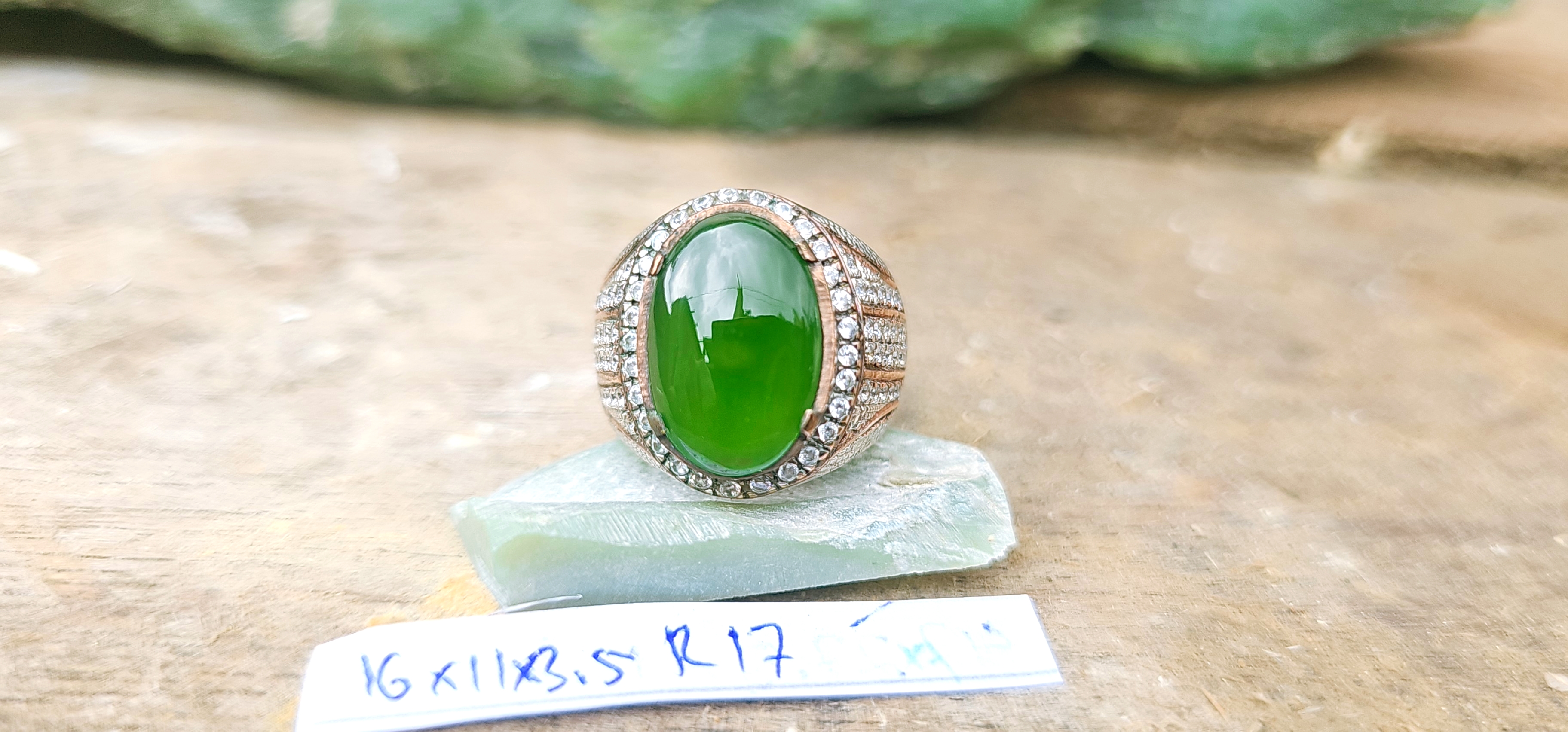 Aceh Natural Moss Green Nephrite Jade Ring with Oval Cabochon Cut and Detailed Setting