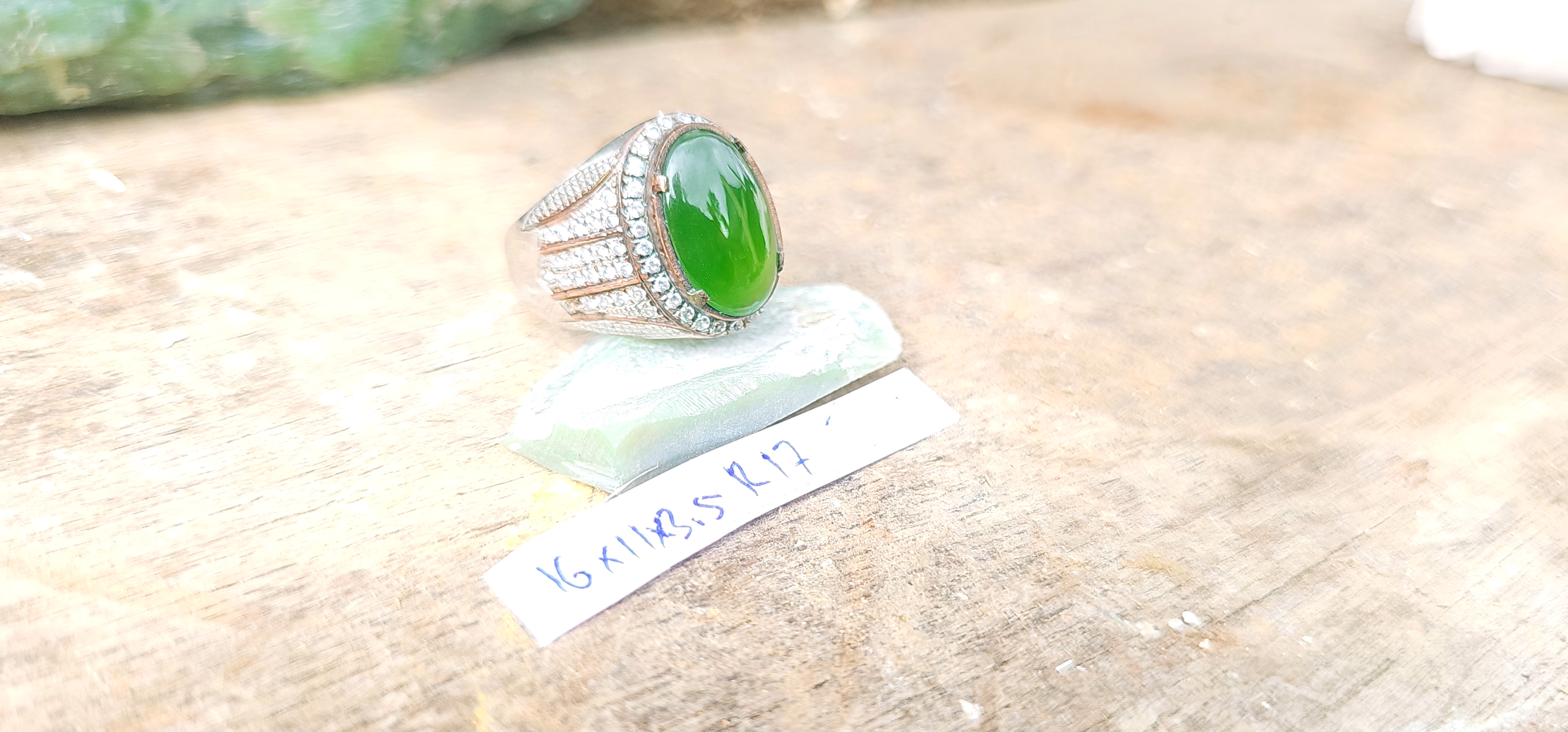 Aceh Natural Moss Green Nephrite Jade Ring with Oval Cabochon Cut and Detailed Setting